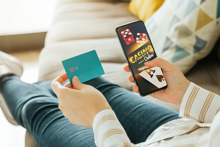 Pengguna mobile menikmati taruhan pertandingan sepak bola di sex18